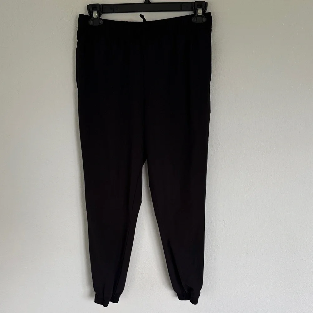 Athletic Works DriWorks girl’s black tapered ankle windbreaker joggers size XL